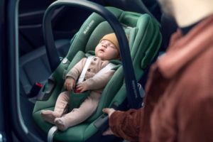 baby asleep in car seat