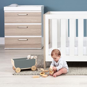 A baby playing with toys